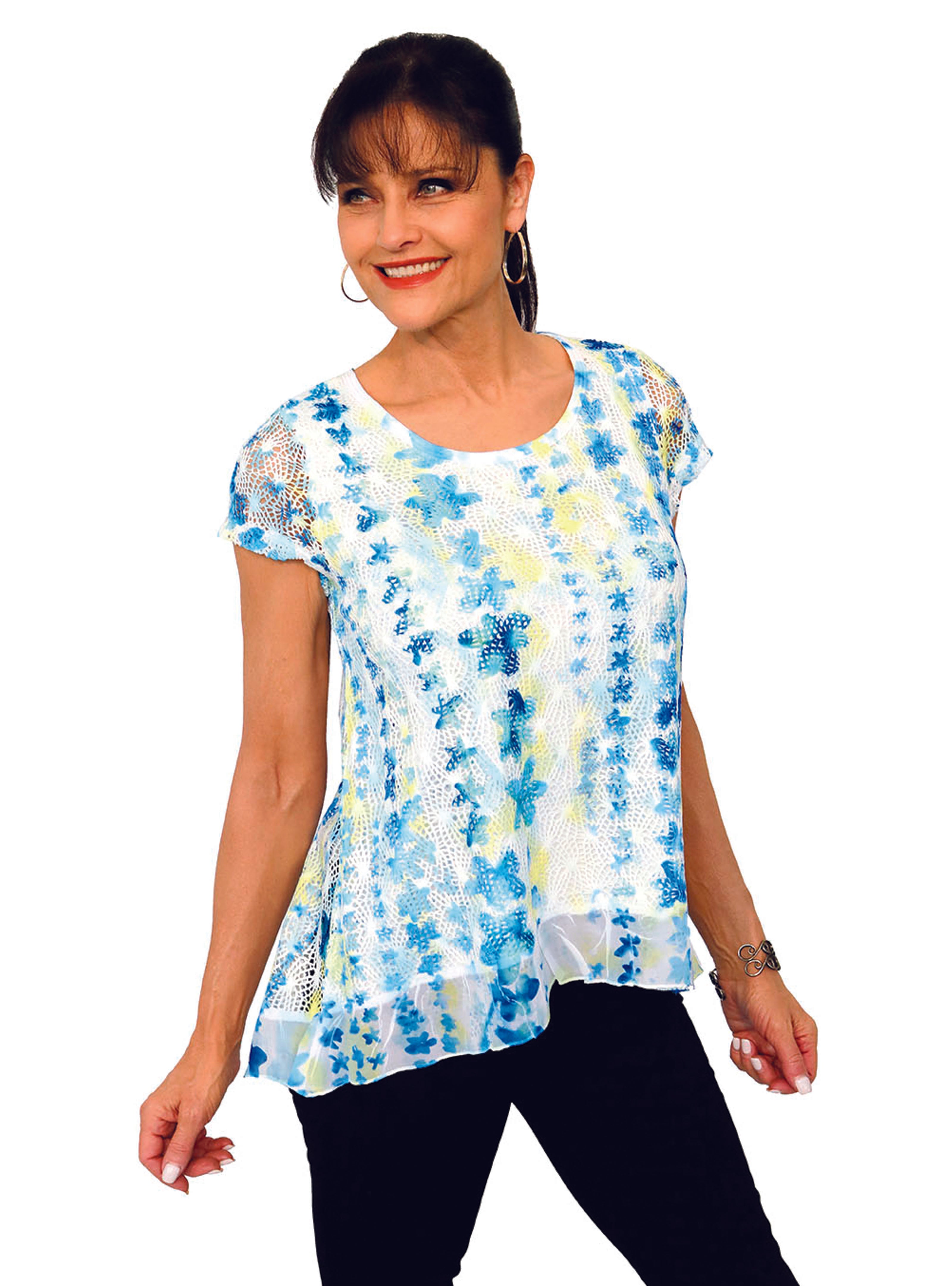 Impulse California Women's crochet top featuring short sleeves and scop neck with a high low chiffon hemline. Imprinted with a neon blue and yellow floral design. Made in the USA.